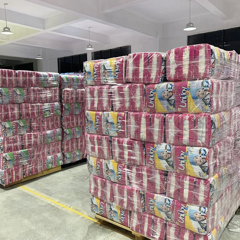 disposable embossed high waistband kiss kids wholesale baby diaper in bales