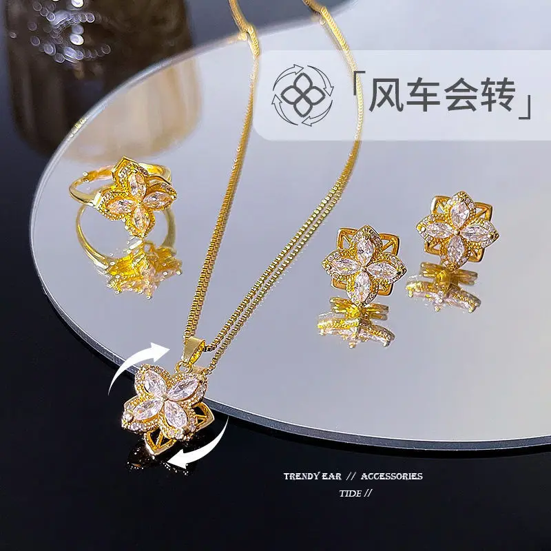 2023 Gold Plated Rotatable Four-leaf Clover Steel Chain Necklace Ring Pinwheel Stud Earrings Set