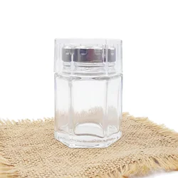 wholesale cheap hexagon food storage honey empty glass jars for canning with lid