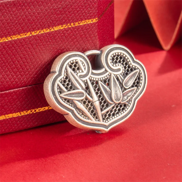 27/5000 Chinese style s999 foot silver bamboo report safety lock pendant leaves ancient style hollowed out one by one
