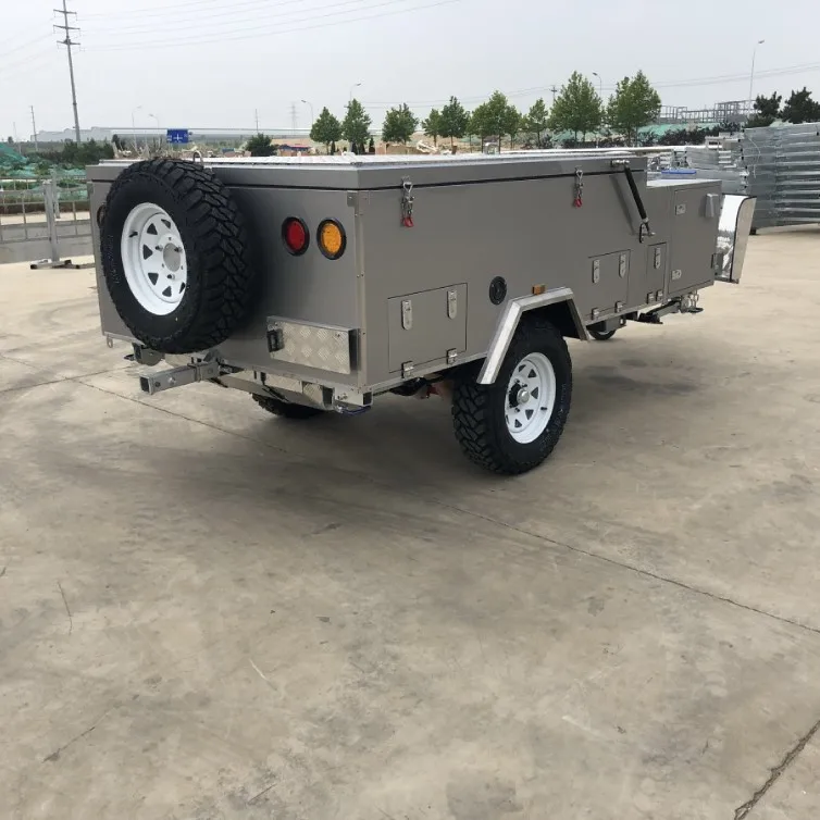 Camper trailer with stainless steel kitchen and folding tap