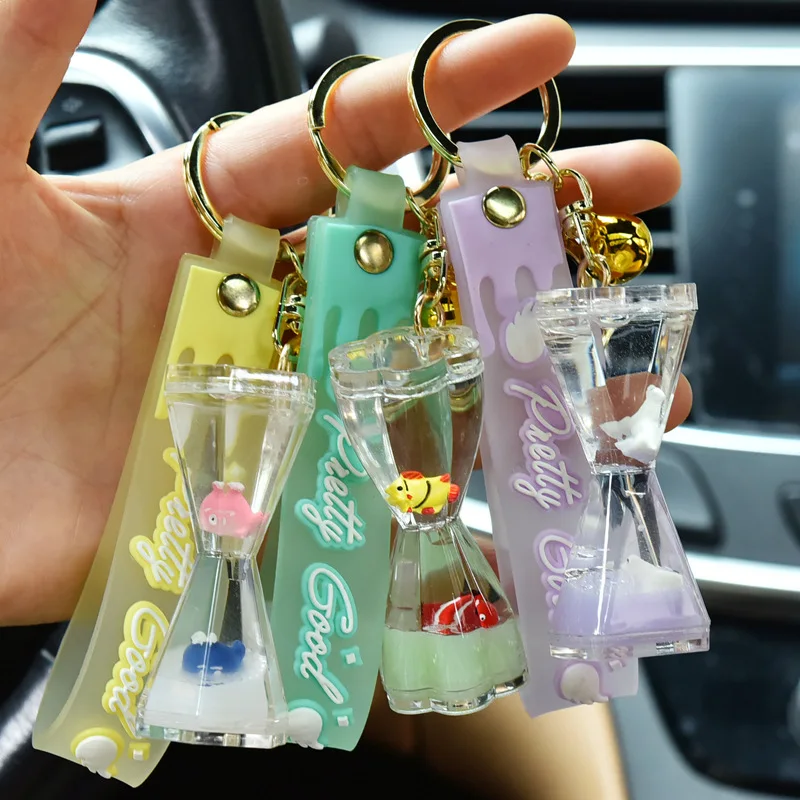 Wholesale quicksand liquid keychain with ocean doll hourglass key chain into oil funnel floating bottle gift pendant