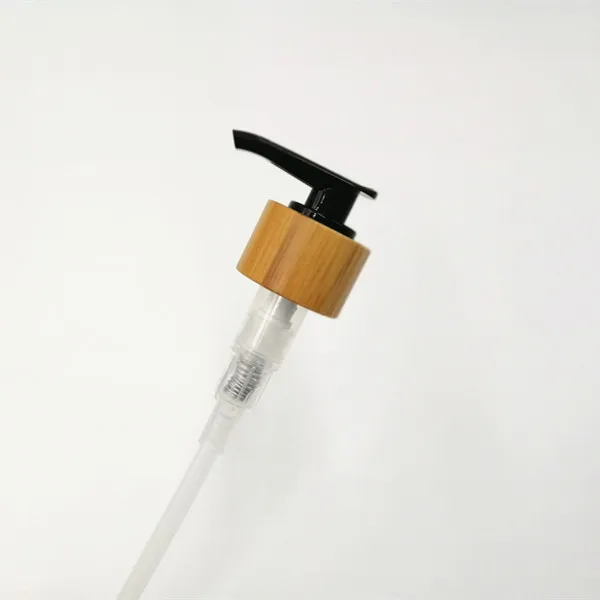 Up-down lock system bamboo lotion pump for cosmetic packaging on bottle