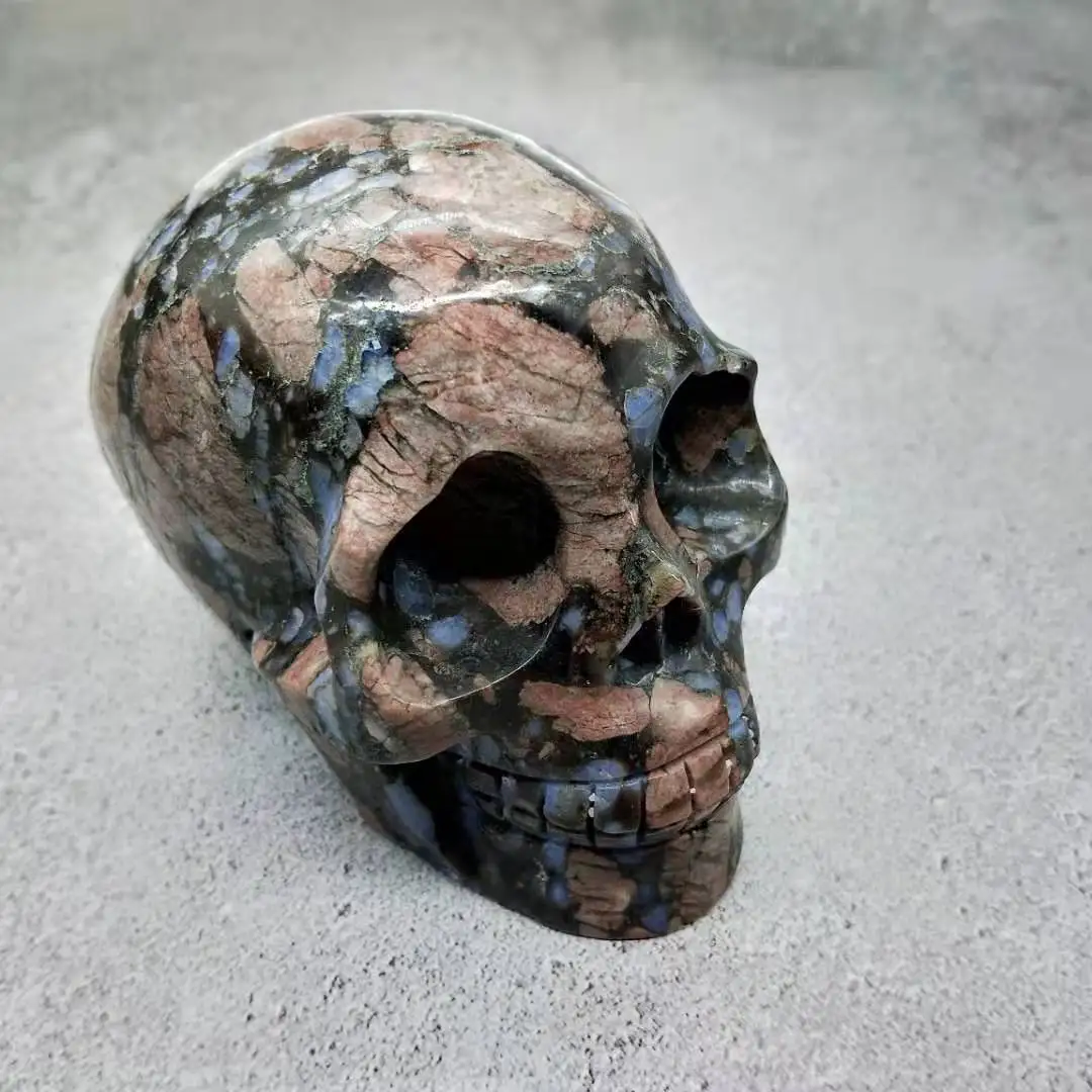 wholesale crystal skulls top quality hand carving human llanite skulls crystal crafts for fengshui decoration