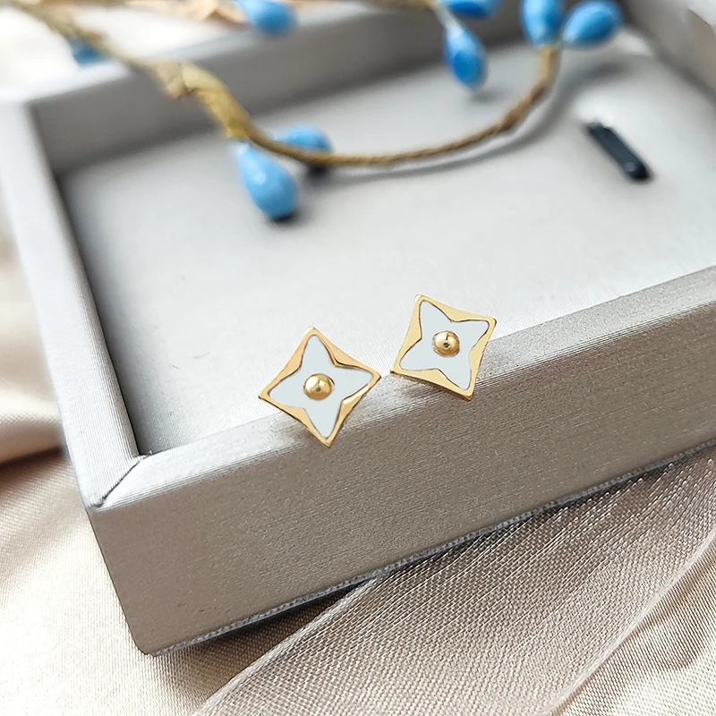 2022 new diamond-shaped white shell trend temperament women do not fade titanium steel earrings