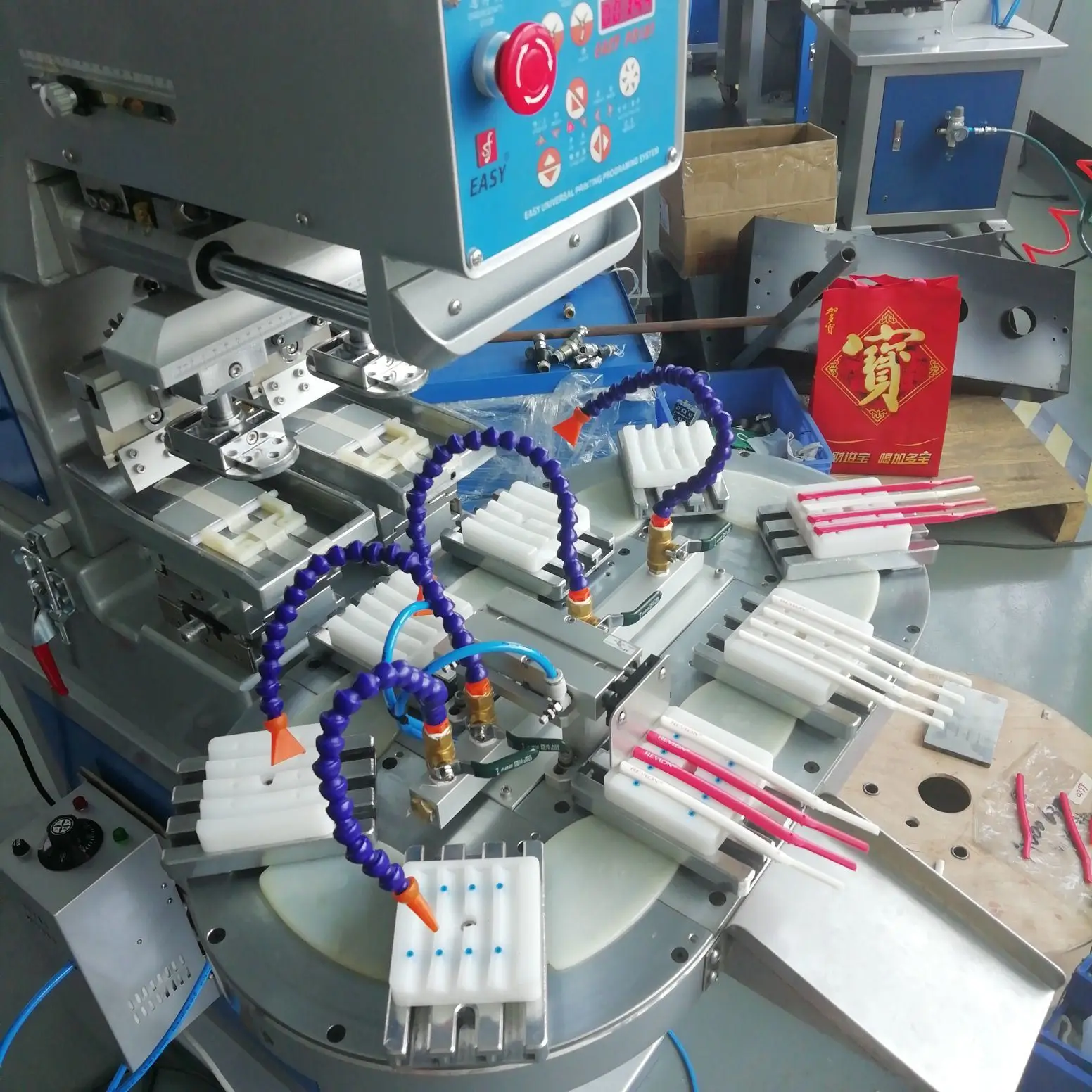 Two color pad printing machine with conveyor