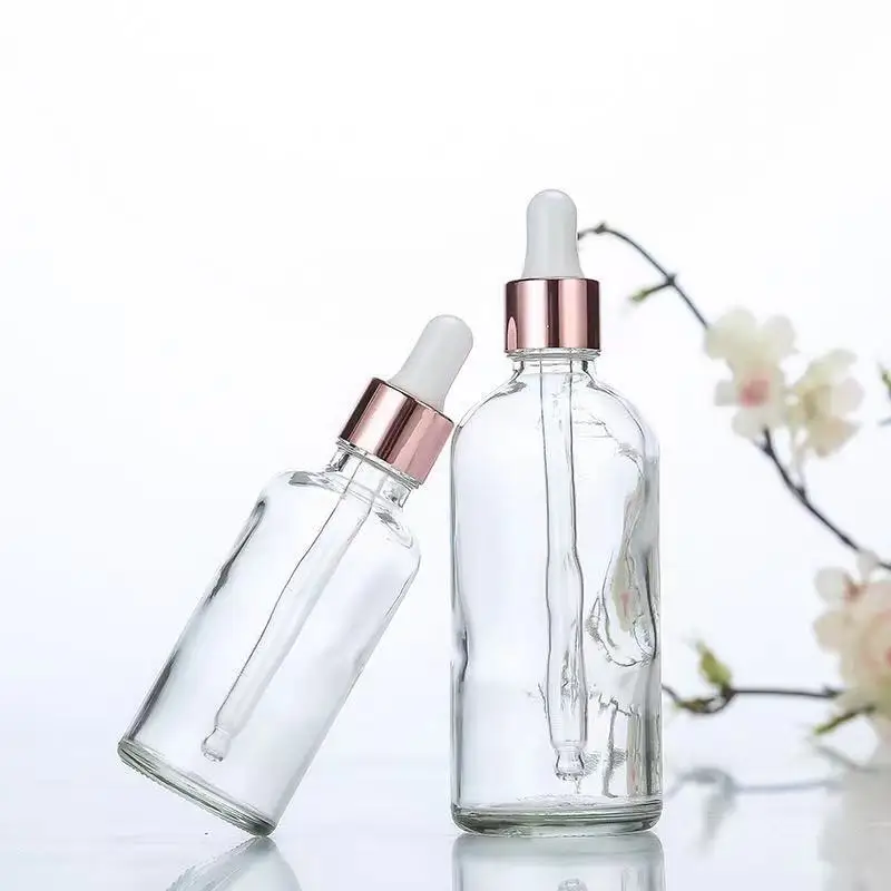 Empty Round 5ml 10ml 20ml 15ml 30ml 50ml 100ml 1 oz rose gold clear cosmetic essential oil  serum frosted glass dropper bottle