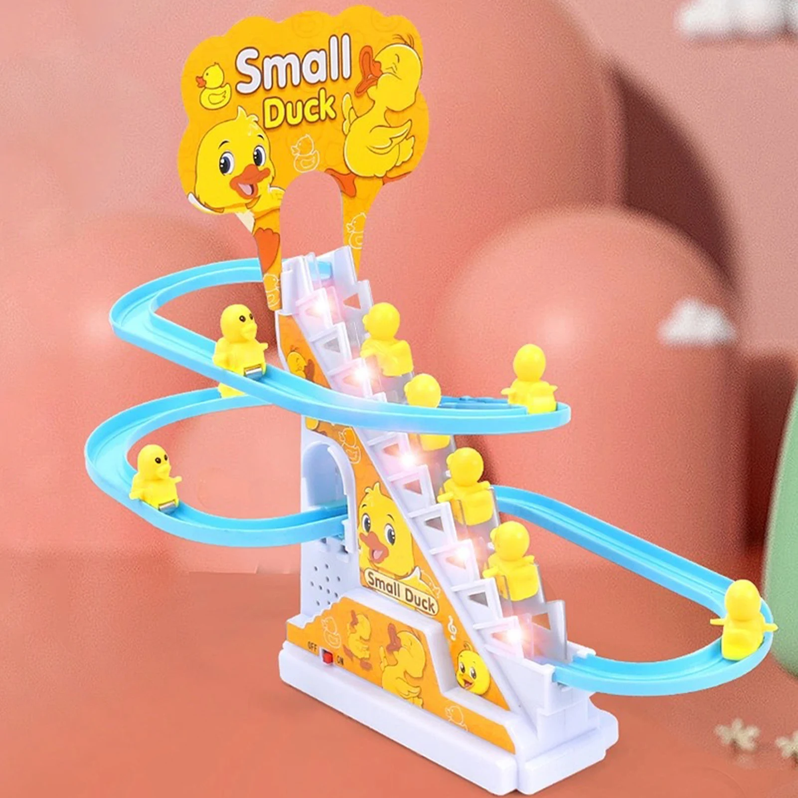 Amazon Hot Selling Duck Climbing Stairs Yellow Rail Car Toys Electric Slide Music Lights Educational Toy Boys and Girls Toys