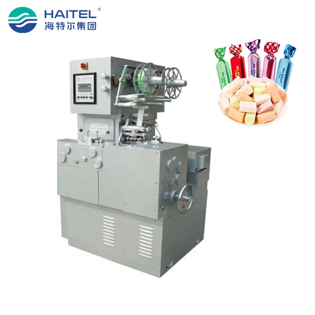Fully automatic toffee candy cut and double twist folding wrapping wrap packing machine