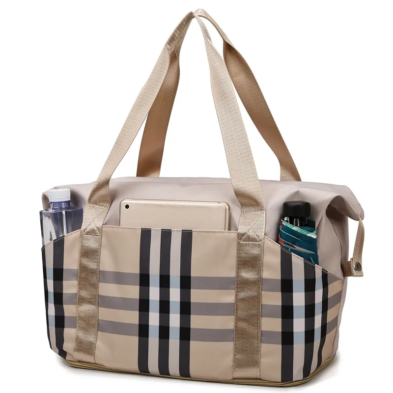 Hand held wholesale water resistance large capacity portable custom logo designer stripe duffle bags for women travel