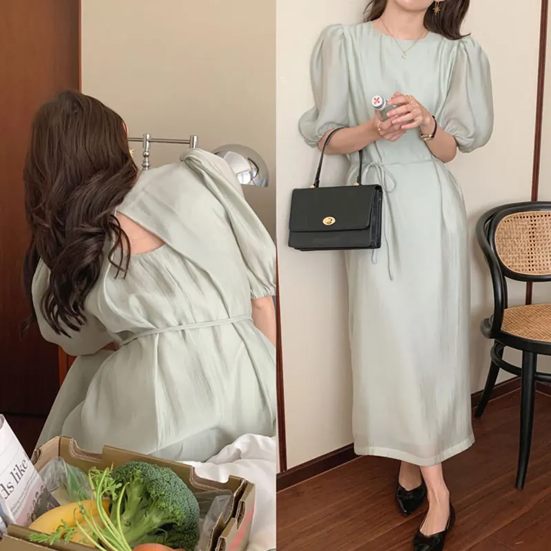 Wholesale 2023 South Korea Soft Green Round Neck Hollow-out Backless Lace Up Waist Solid Color Bubble Sleeve Dress