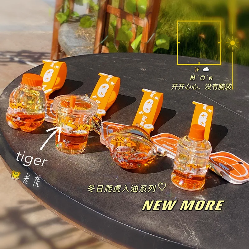Crawl tiger keychain Floating acrylic key chain flash car key bag pendant lovely float bottle into oil key