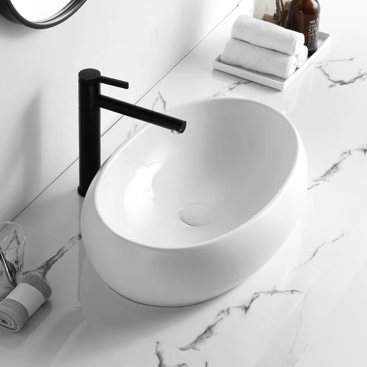 Modern Above Counter Oval Basin Ceramic Solid Surface Table Top Wash Basin Bathroom Vessel Sink
