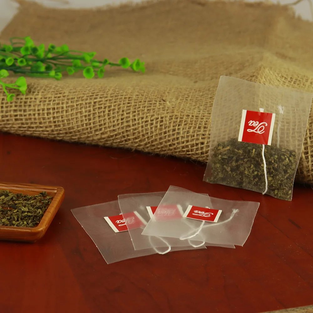 Высококачественный чайный пакетик, оптовая продажа, нейлоновый цветочный чайный пакетик, фильтровальная бумага, нейлоновый чайный пакетик в виде пирамиды, можно настроить