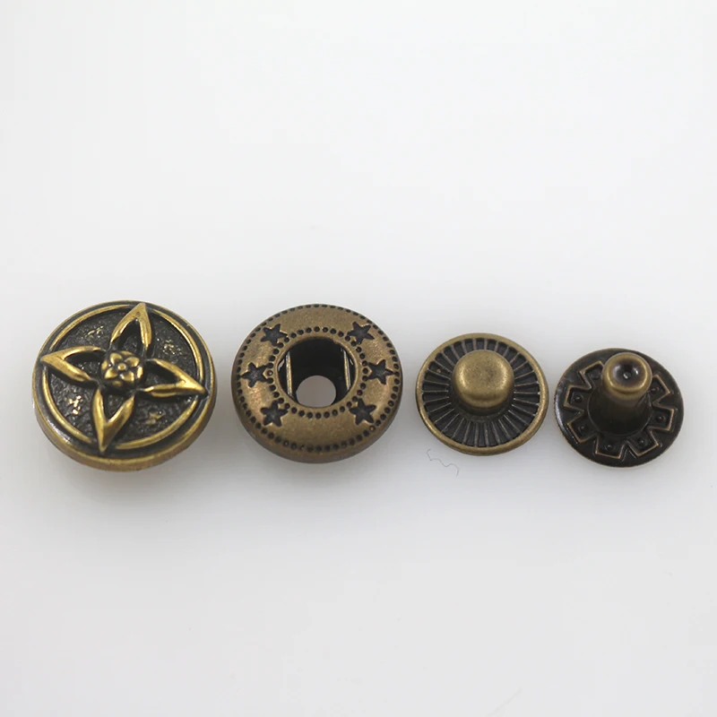 Custom engraved logo flower pattern spring snap fastener metal four part snap button for clothing