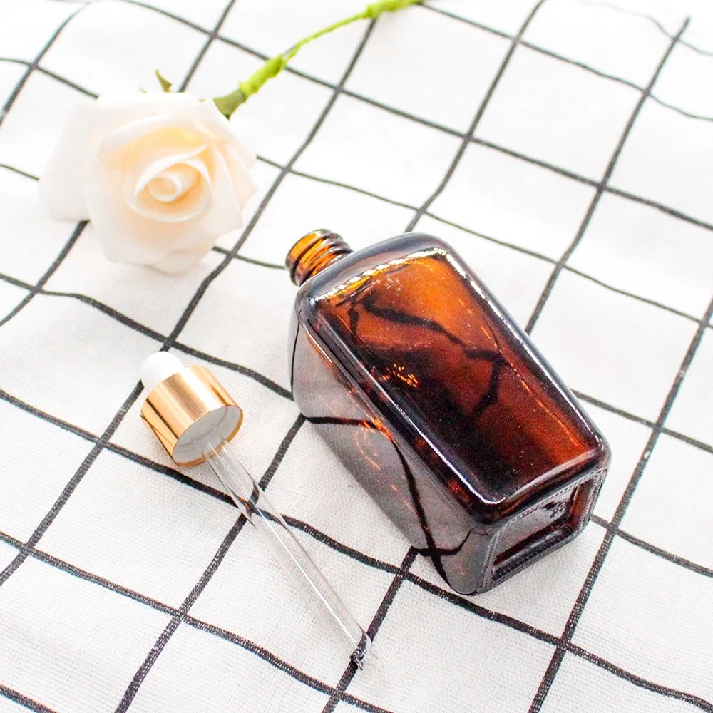 FENGJUN customizable amber square essential oil bottle glass cosmetic bottles with rubber top gold collar dropper for cosmetic