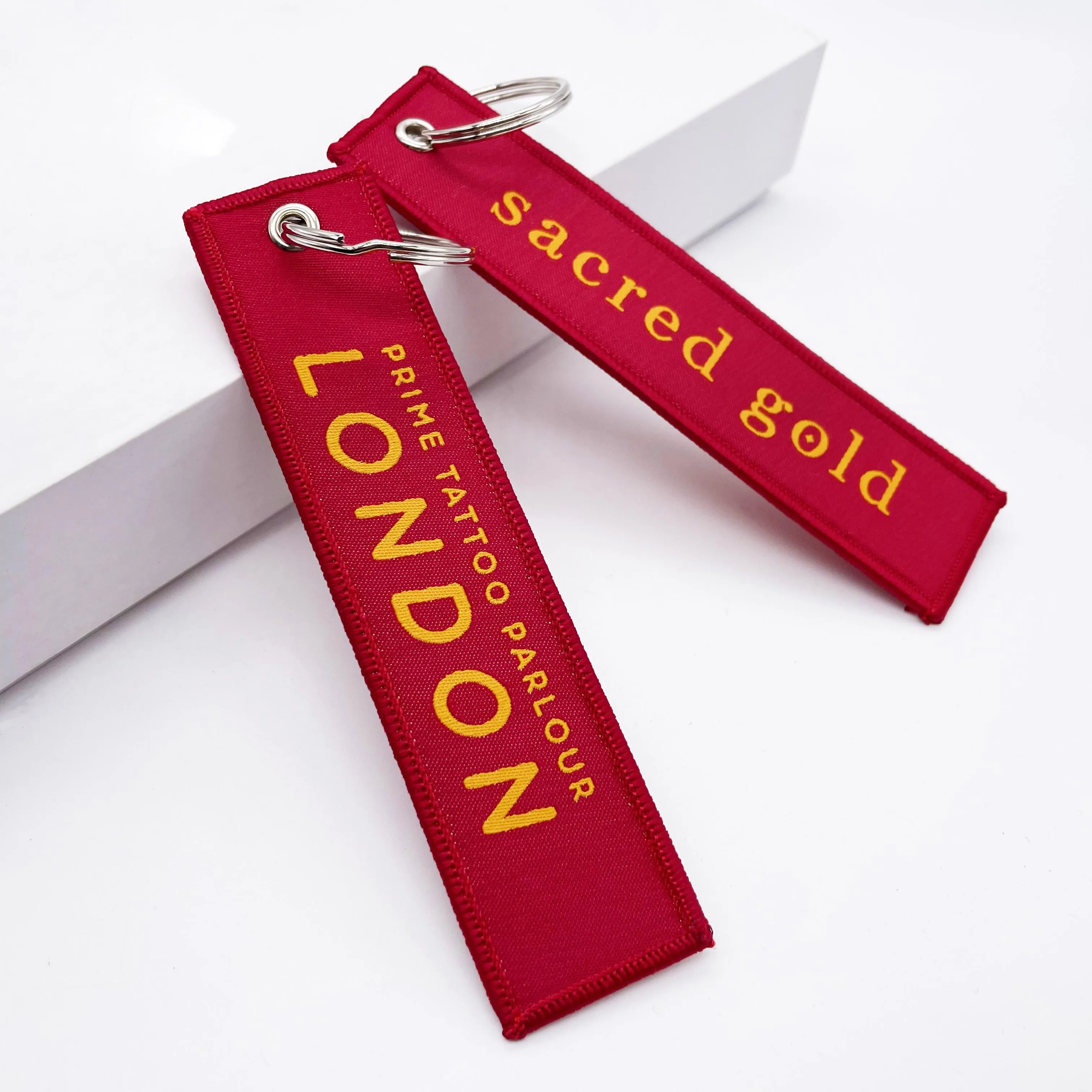 wholesale custom aircraft aviation label key chain fabric Personalized Remove before you fly embroidered key chain rings