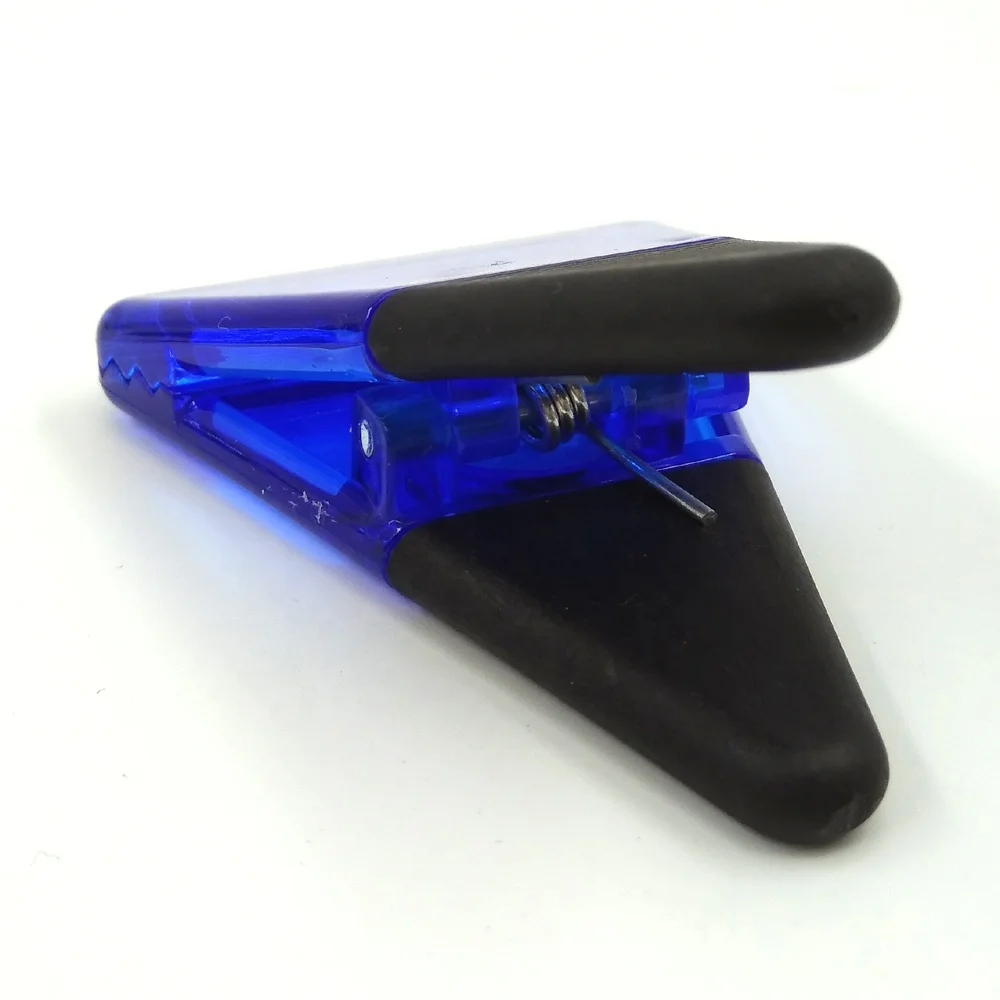 plastic triangle fridge magnet paper clip