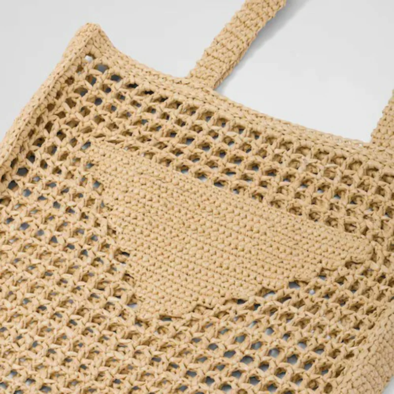 2023 brand mesh beach woven one-shoulder ladies handbag environmental protection paper rope grass hand woven bag