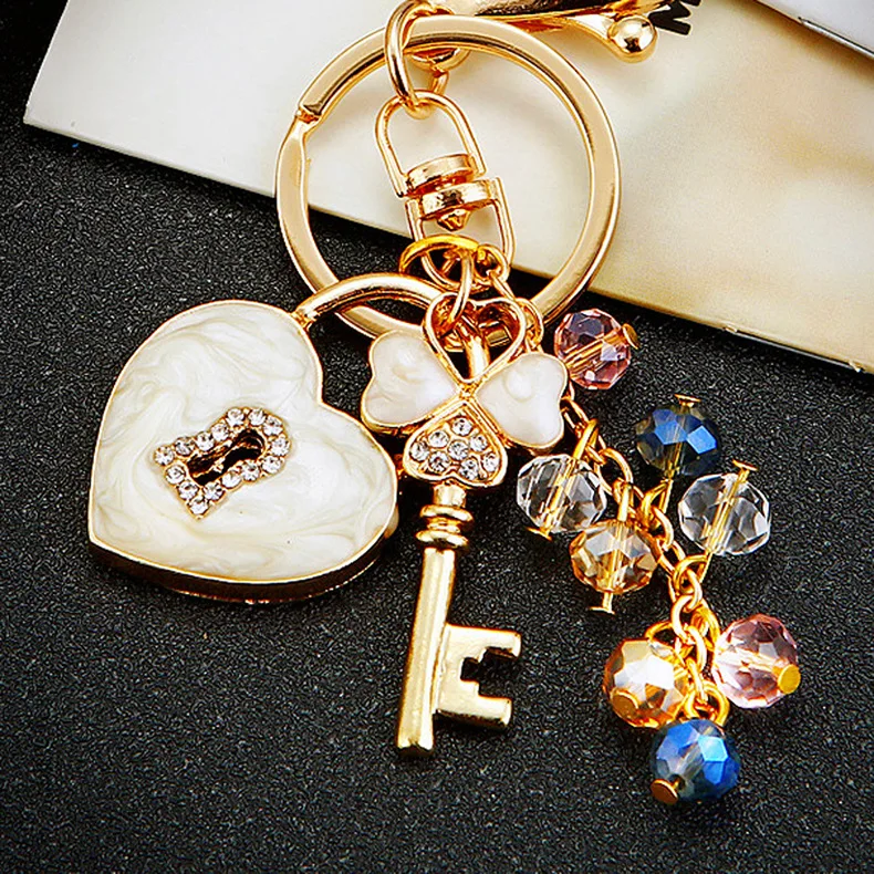 Wholesale Gift Female-Friendly Creative Clover Love Lock Metal Keychain Diamond Inlaid Concentric Lock Bag Pendant
