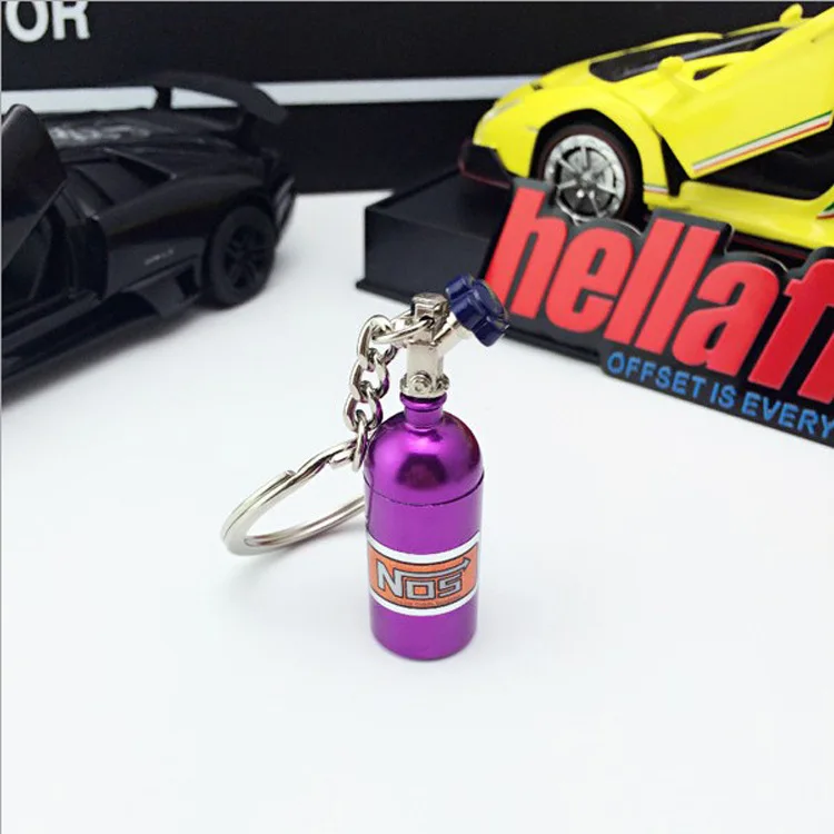Hot selling nitrogen bottle keychain can be customized creative metal turbo cartoon NOS auto parts metal keychain