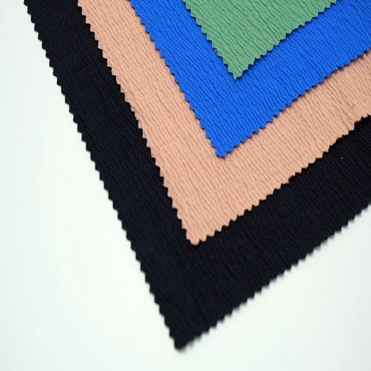 Hot selling light weight breathable TR Crepe knit fabric 68poly 28rayon 4spandex for women dress in spring summer