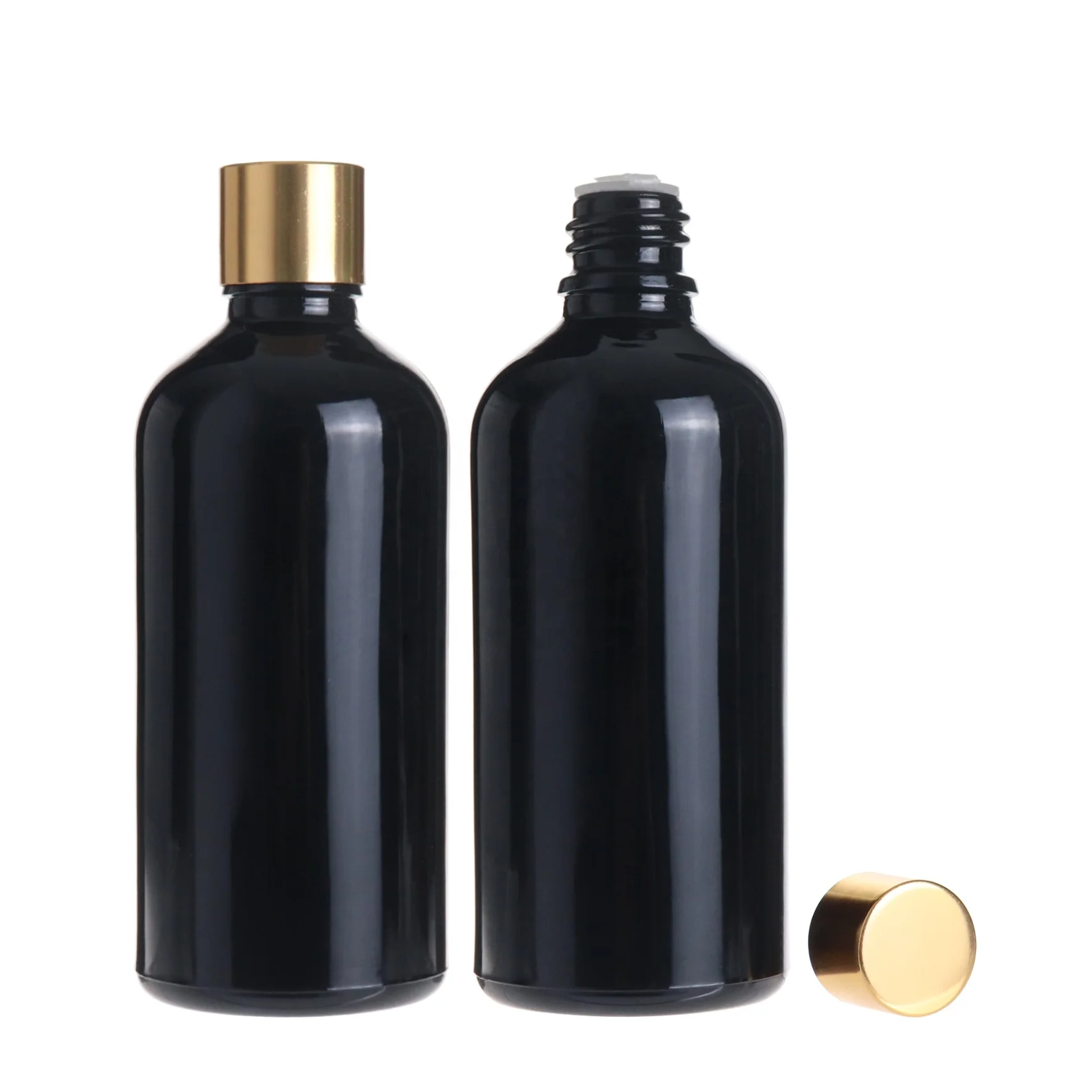 Empty round massage essential oil cosmetic black glass bottle 100ml with golden screw cap