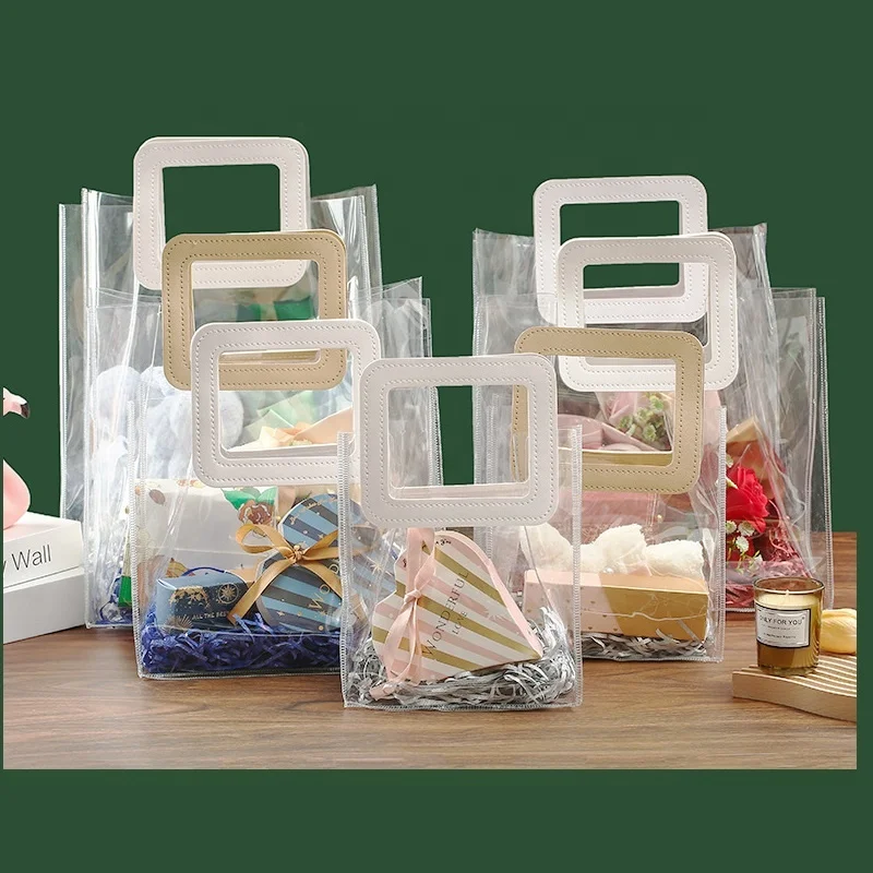 Wholesale hot sale transparent pvc hand bag waterproof beautiful clear plastic handbag tote shopping purse for woman with print