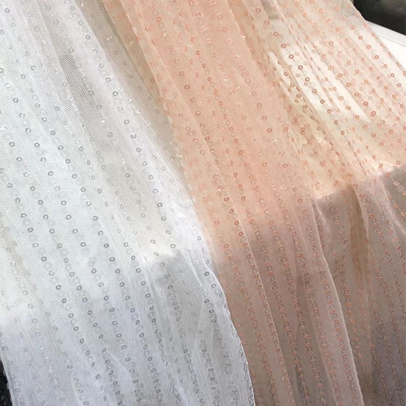 Highly cost effective nude mesh fabric beautiful embroidery fabric sparkly pailette sequin fabric for party wedding