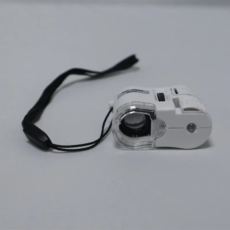 Hand held led light 60x mini portable jewelry microscope with money detector 9595