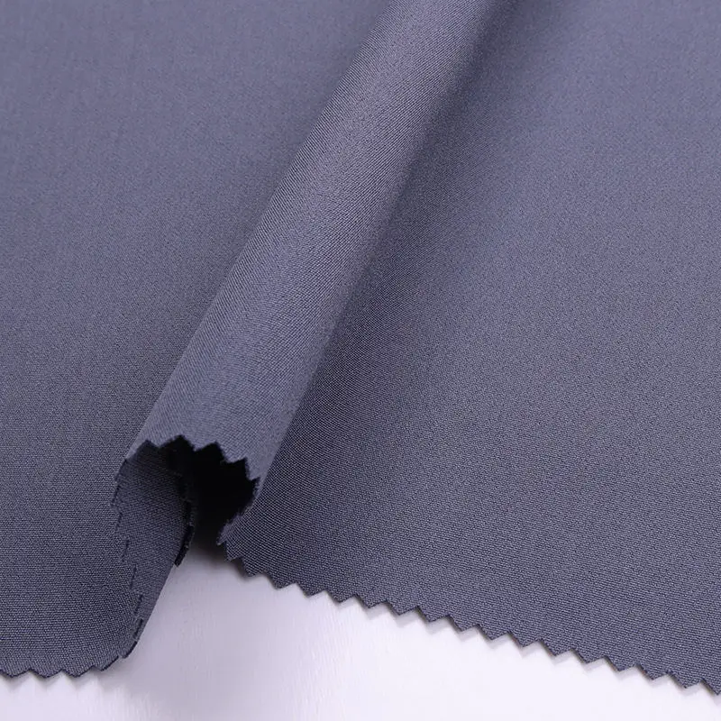 Shaoxing yuyuan imp Hot Sale Wholesale 100d 130gsm Plain Solid 4 way nsLycra Fabric Indian nsLycra Fabrics Garments ns fabric