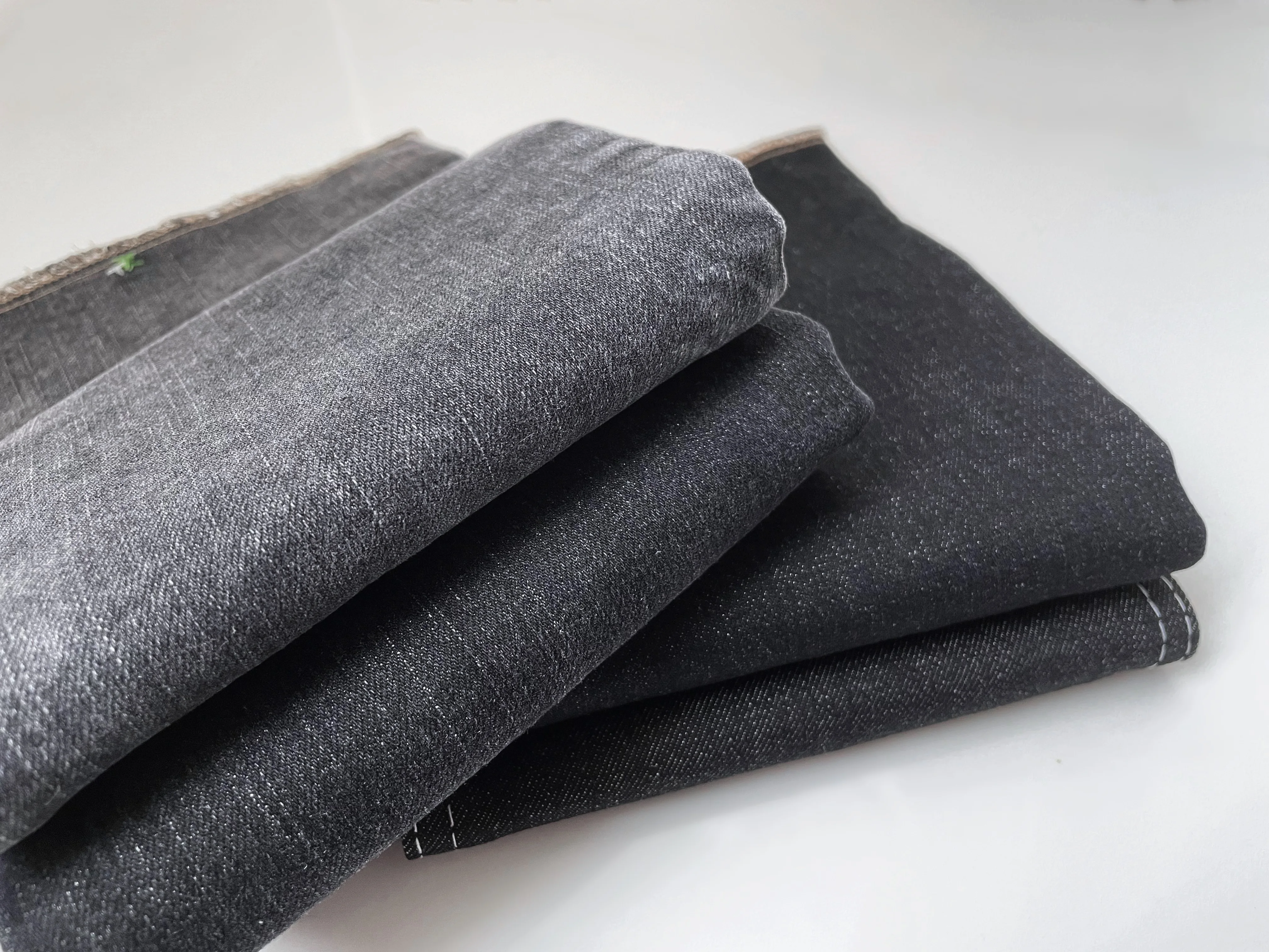 Manufacturer recommended high quality black 10.7oz TR stretch cotton slub denim fabric for jeans