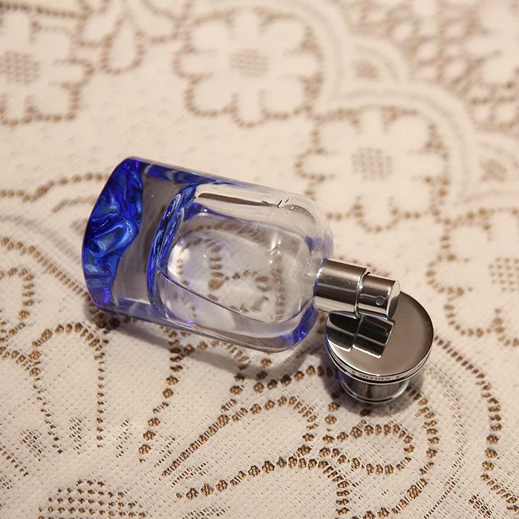 2021 Unique Design Blue Luxury Cylinder Empty Wholesale Unique Perfume Glass Bottle Refillable Glass Bottle Perfume