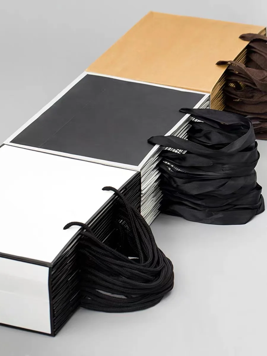 BTO wholesale oem black paper bag with ribbon boutiques shopping bags coated paper bag custom printed logo luxury clothing shop