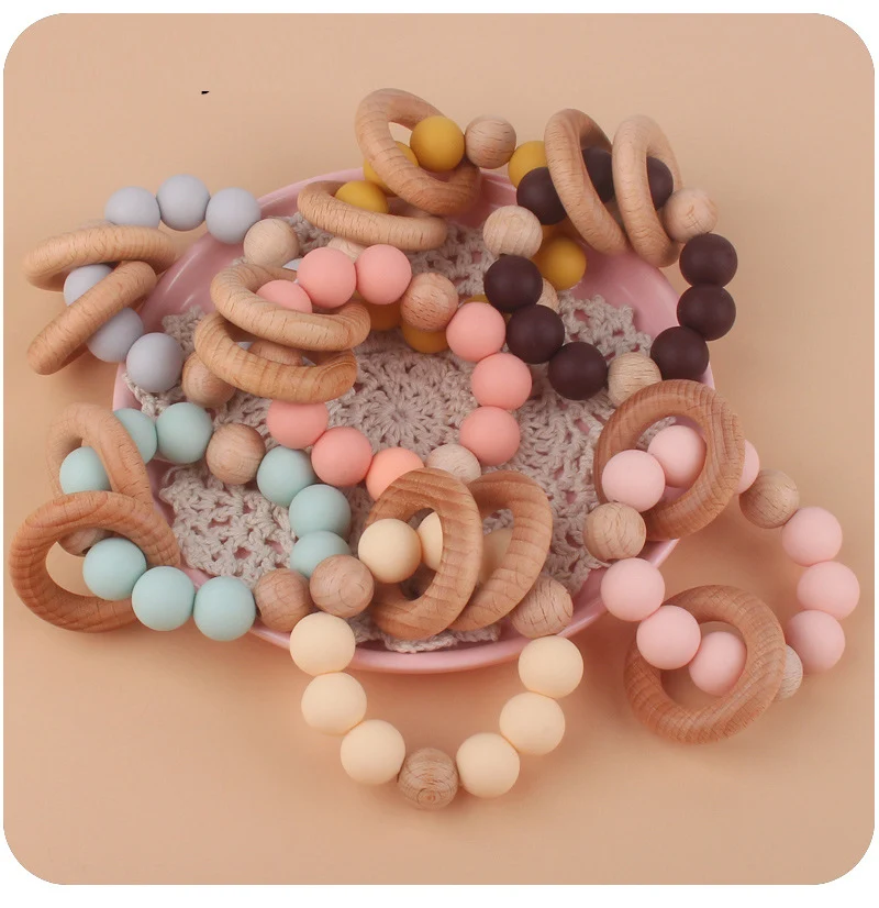 Wholesale Non-toxic Wooden Teething Toy Baby Teether Bracelet Silicone Beads Teething Beech Ring Rattle