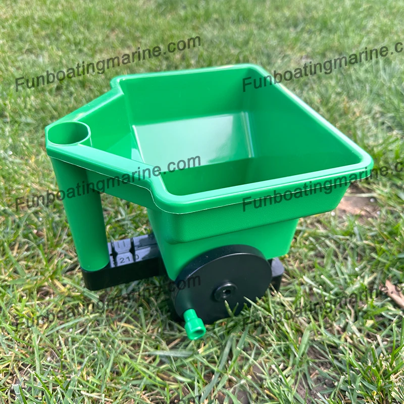 Hand-held spreader for fertilizer lawn lawn and fertilizer seed spreader