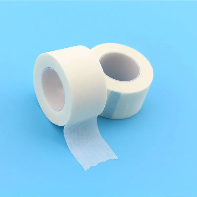 White skin color Adhesive Surgical Microporous Non Woven Paper Medical Non woven Tape with dispenser cutter
