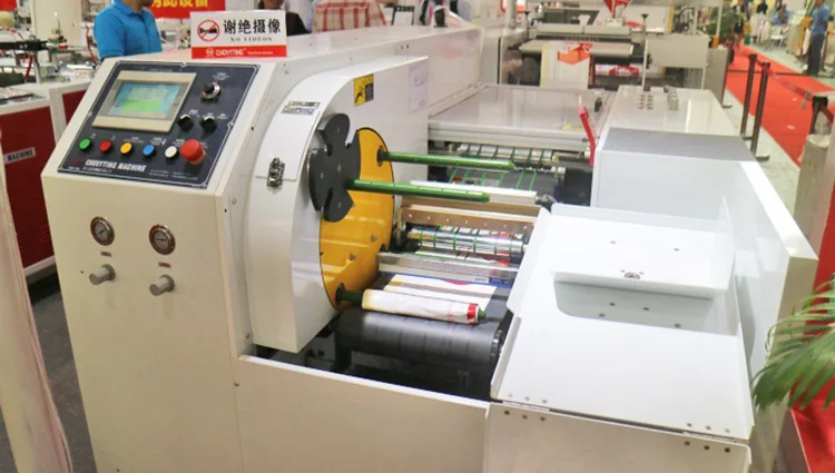 
Bagging machine for sales perforated and interleaved drawstring garbage bag making machine draw tape rolling bag making machine 