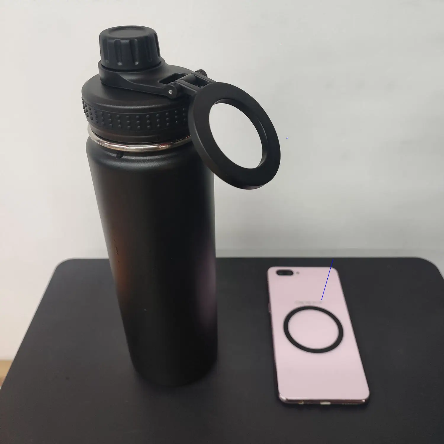 gym water bottle with magnetic phone holder 24oz double wall magnetic ferrofluid liquid water in bottle display