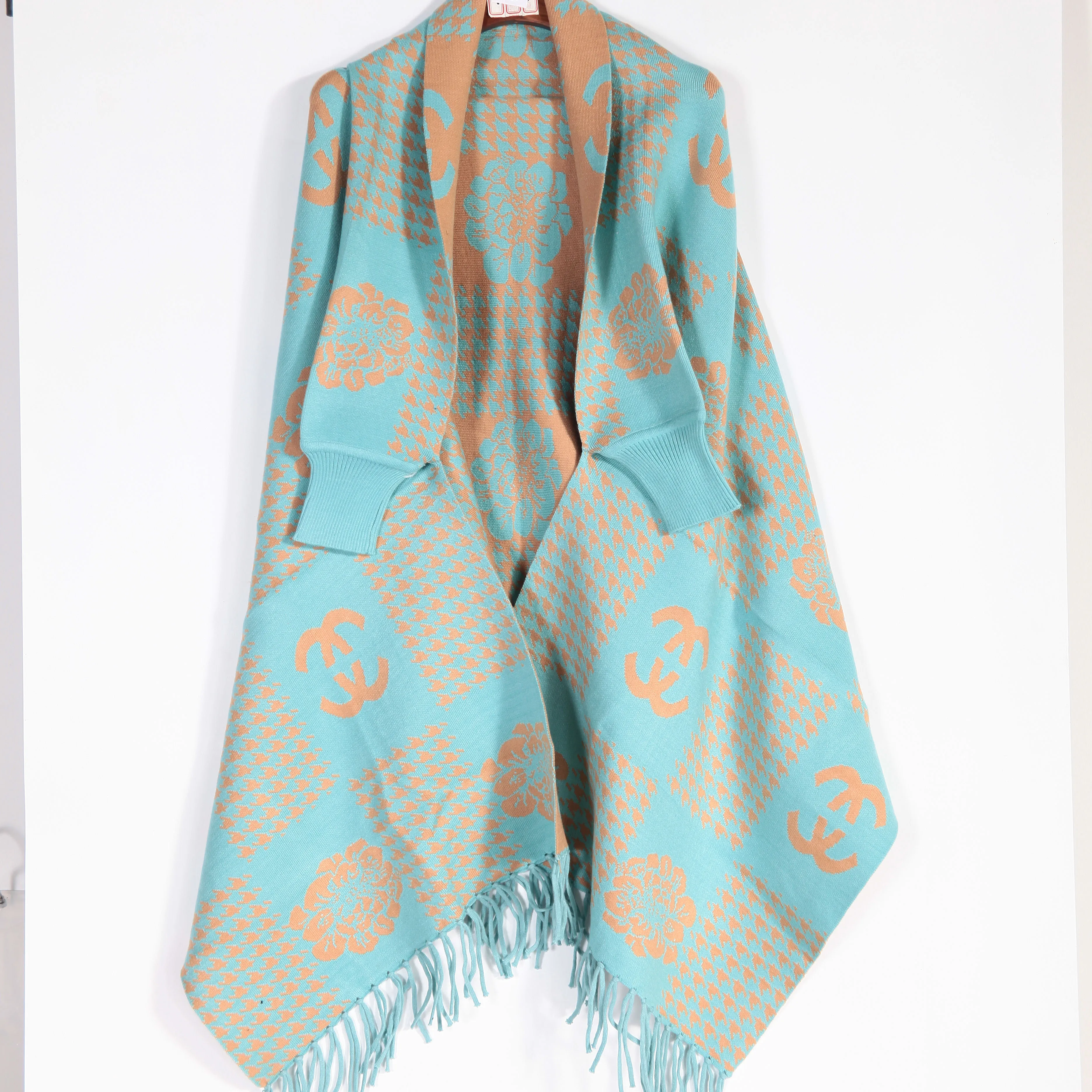 
Wholesale Spring 2021 New Arrival Turn Down Neck Women Knitted Poncho Sweater Patterns Shawl Crochet Poncho For Women Sweater 