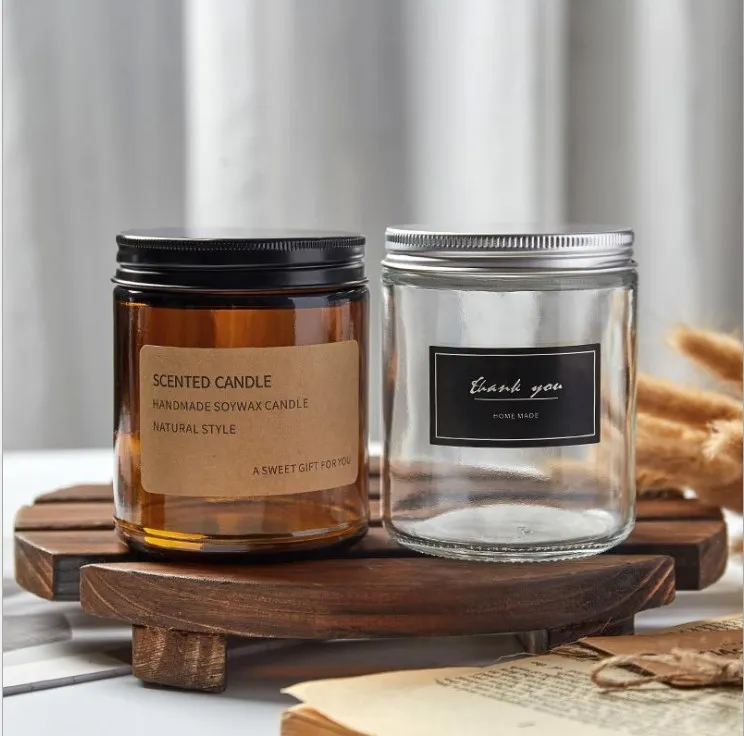 Custom logo luxury clear/amber glass candle jars 2oz 4oz 8oz glass candle holders with metal lids for candle wax for sale