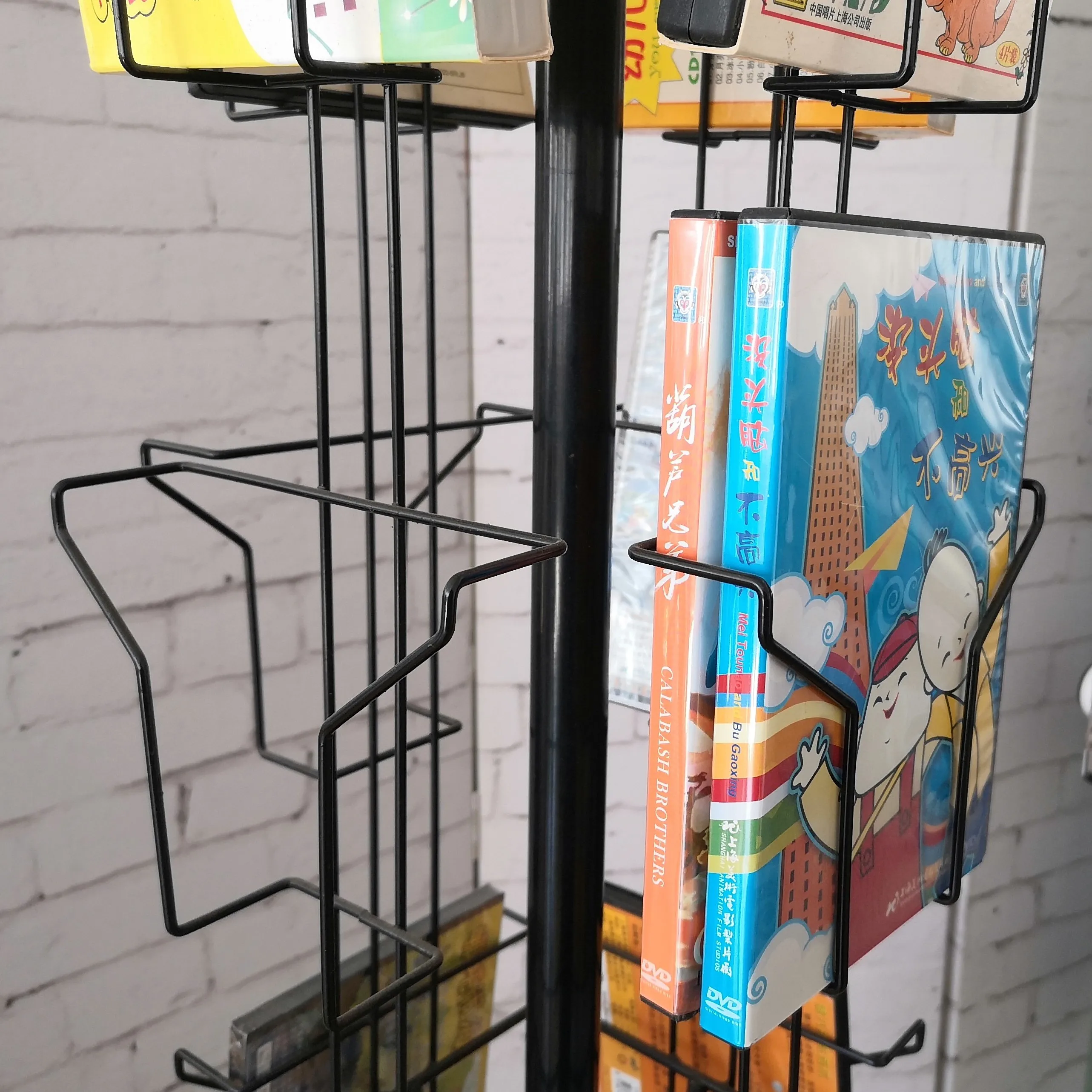 DVD Spinner Metal Displays Floor Stand in Video Shop