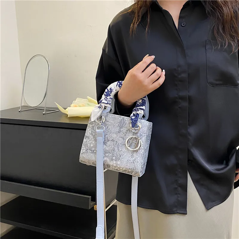 High quality designer floral texture ribbon handbag fashionable daily outfit women shoulder crossbody bag elegant charming