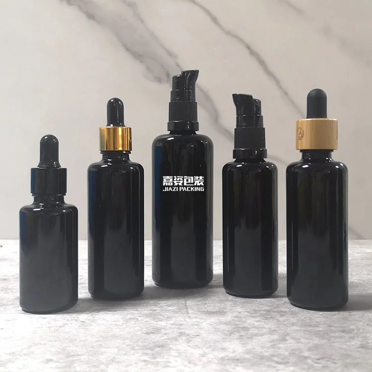 Wholesale 30 ml 50 ml Black UV serum dropper bottle Refillable 100 ml essential oil dark violet cbd oil glass bottles