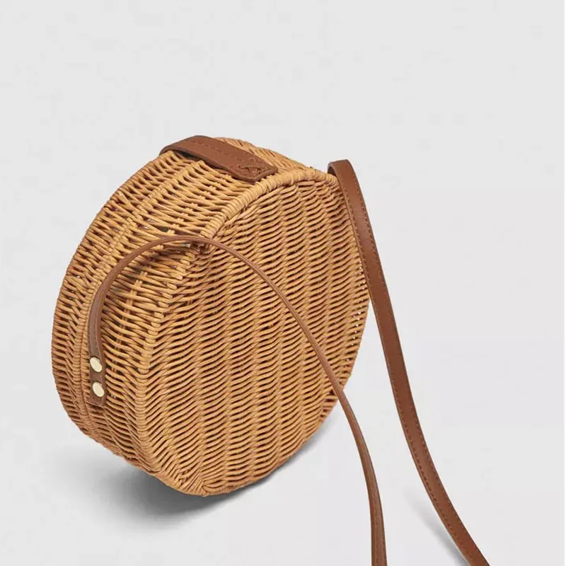 High quality portable lightweight cheap round summer rattan bag indonesia