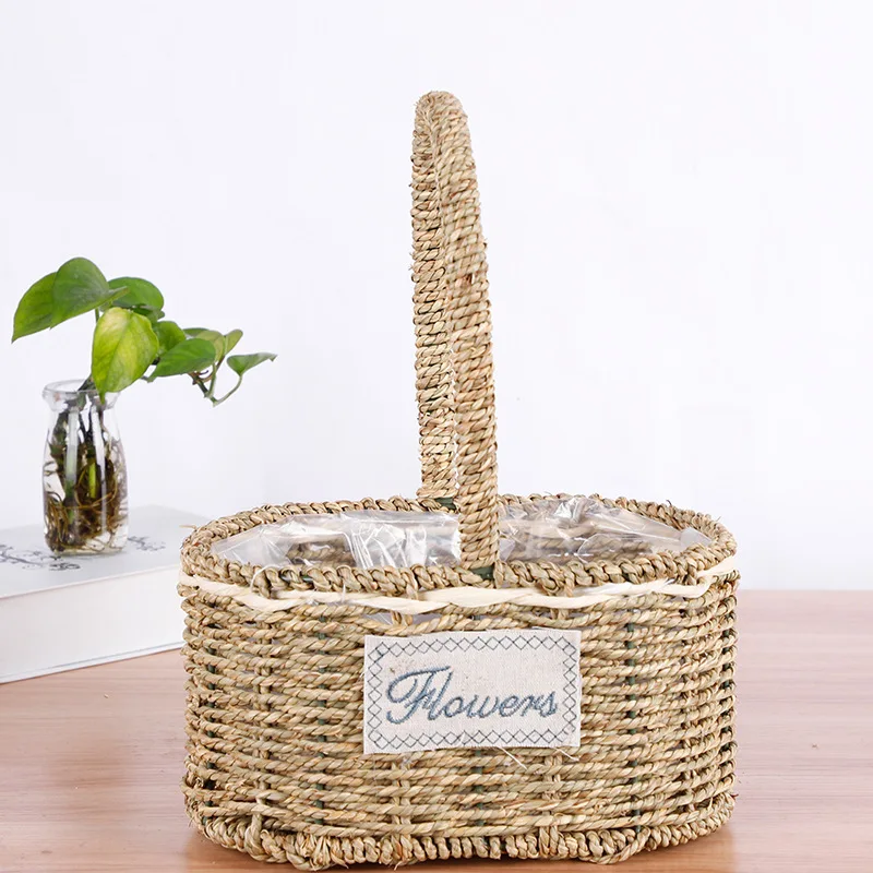 handmade straw braid woven flower basket with plastic liner/wholesale straw grass rope flower gift basket with plastic liner