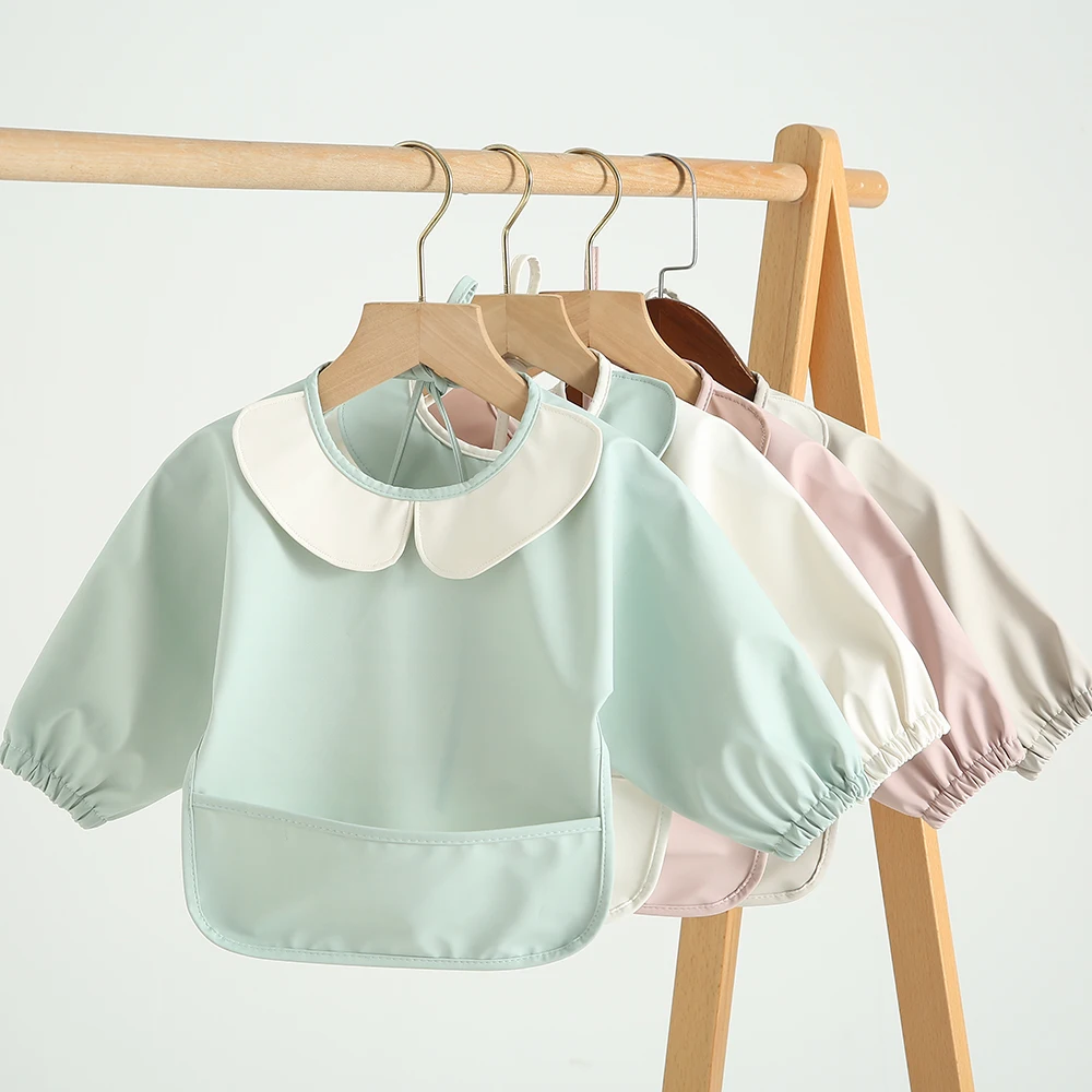 Long Sleeved Bib Children Smocked Clothing Washable Baby Apron OEM Service 100% Polyester Natucare BSCI Hot Selling Baby