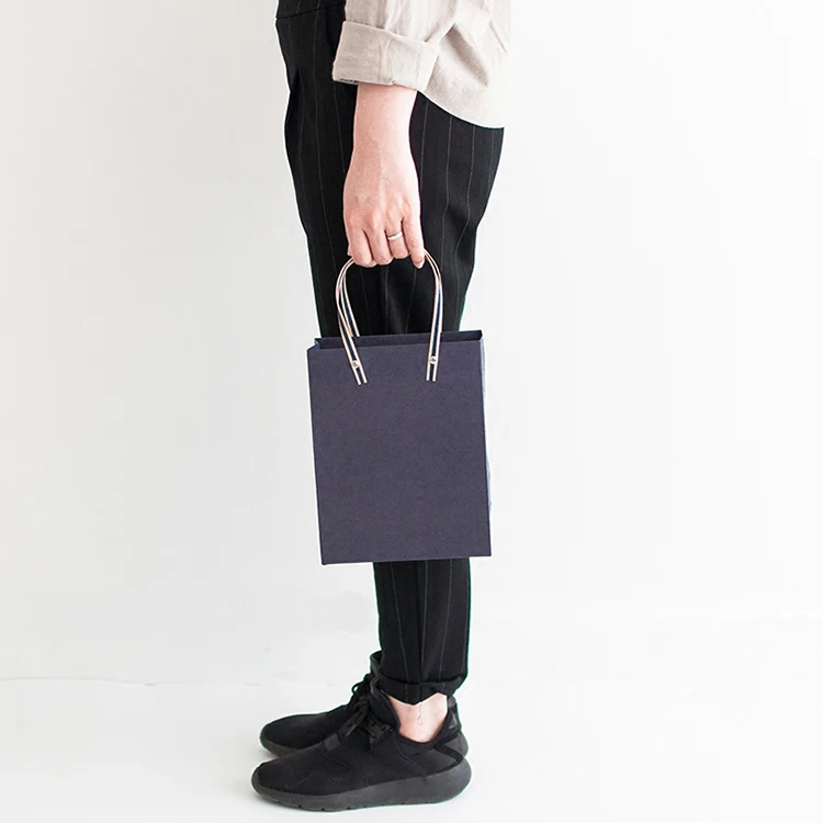 Wholesale high quality printed paper bag shopping bag with rivet and flat handle