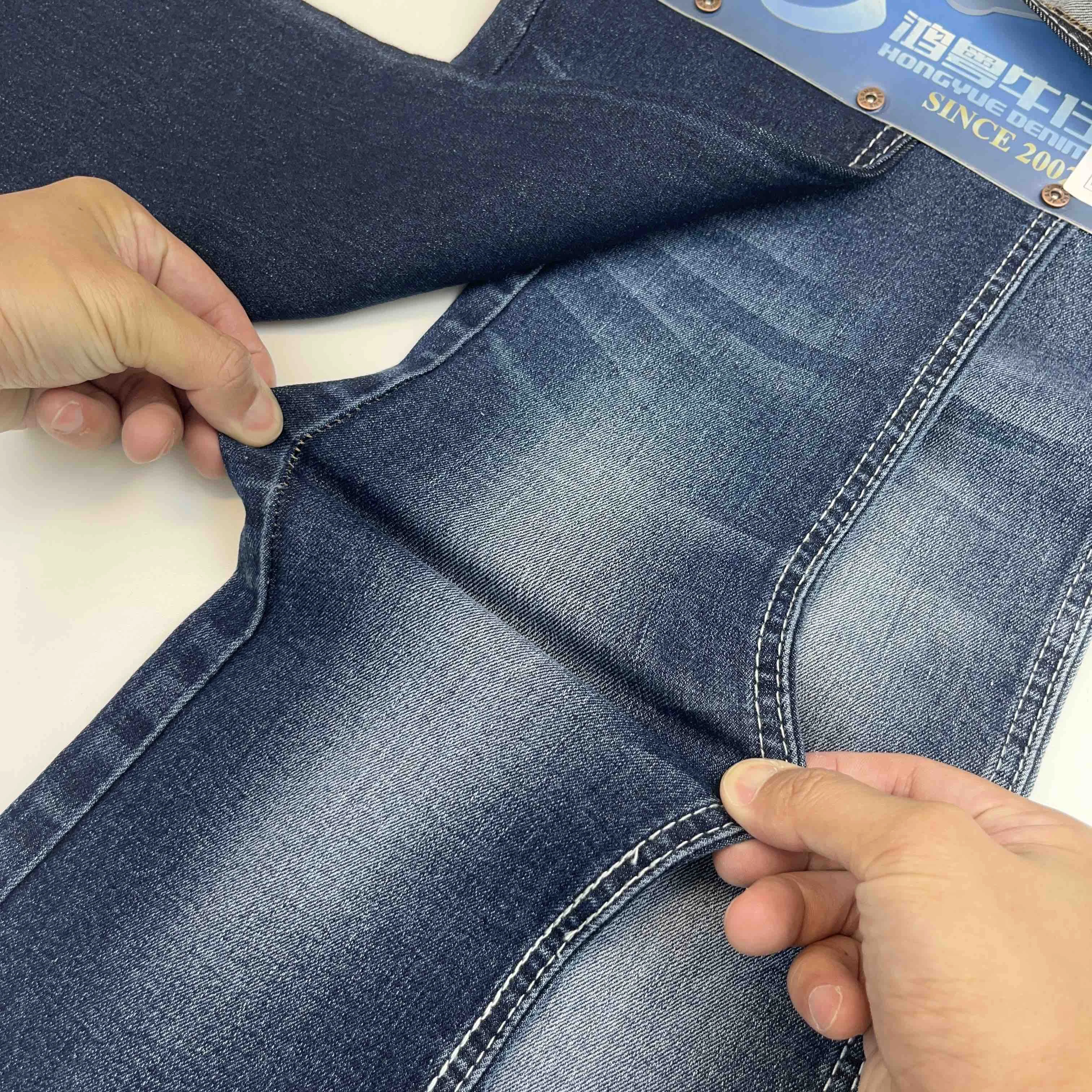 Soft Comfortable Twill Stretch Denim Jeans Fabric With Custom Design Slub Raw Denim Fabric Manufacturers In China