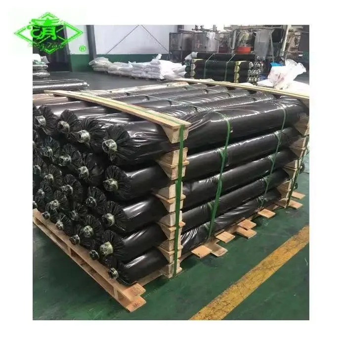 Black plastic ground cover/ weed control mulch layer